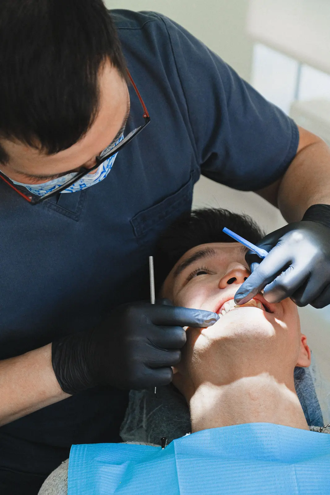 Careful chairside work on a single tooth, alongside the Implants In Vaughan explanation in Toronto