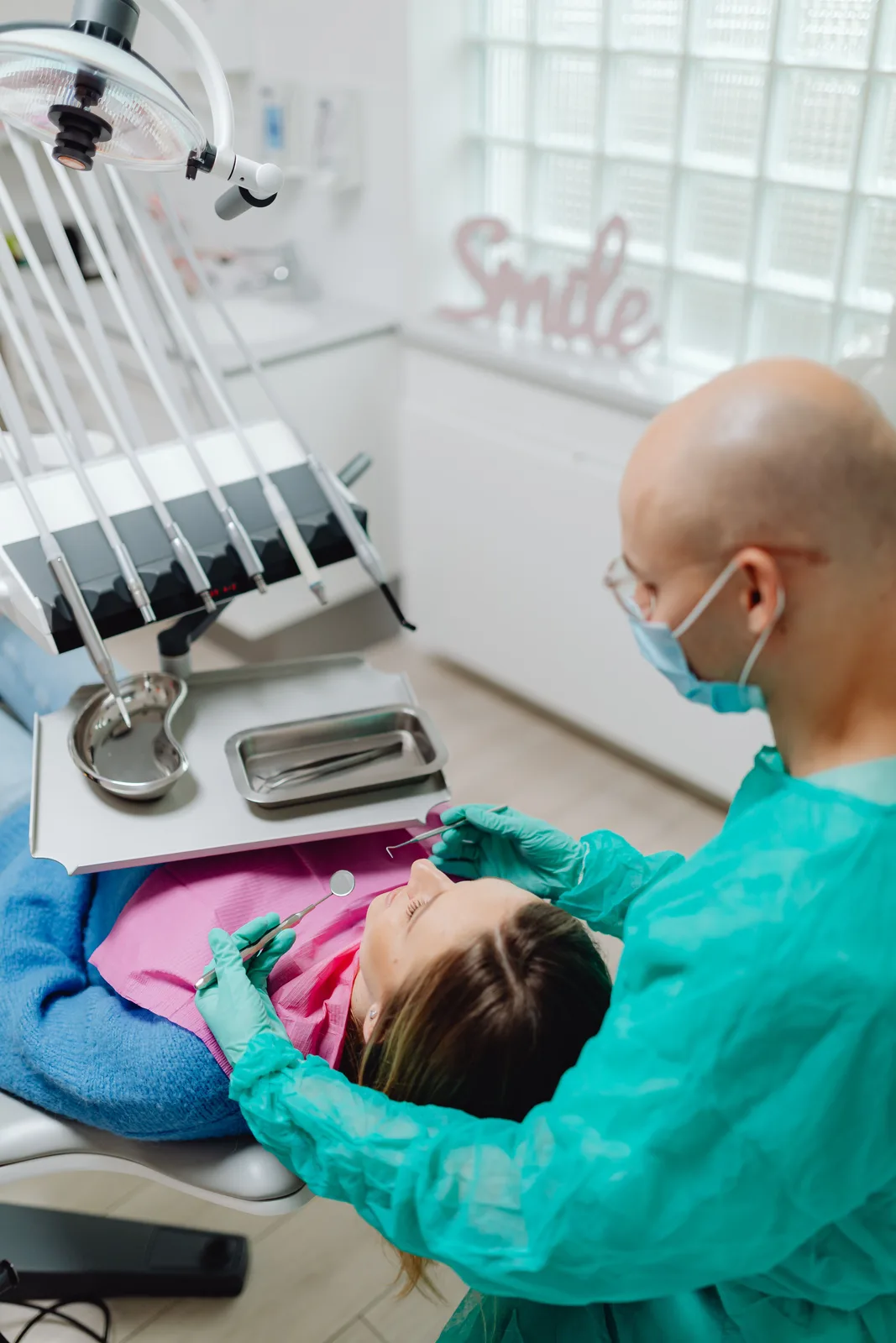 Chairside treatment with a sterile instrument tray, alongside the Full Mouth Restoration explanation in Toronto