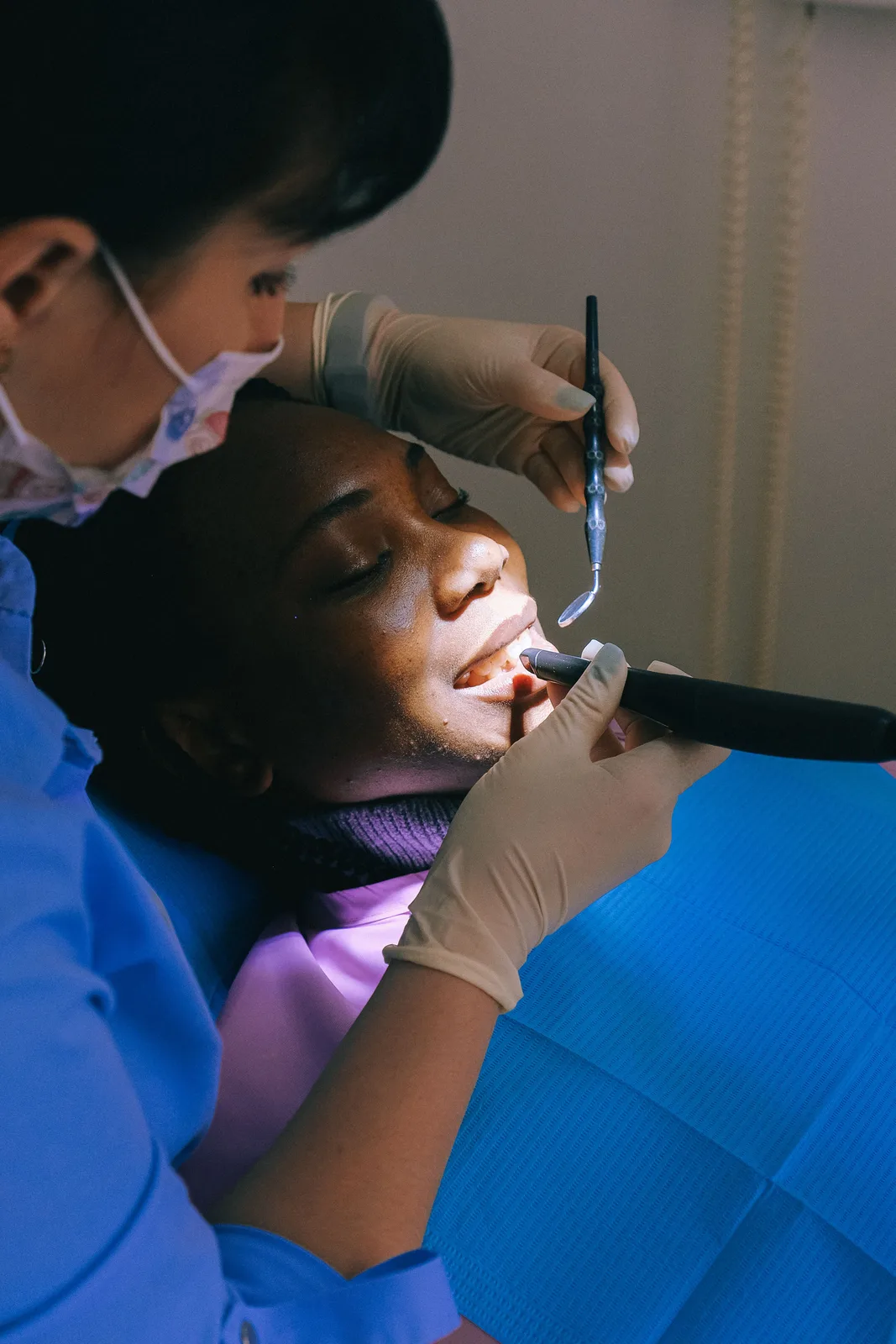 Curing light used during a restoration, referred to in the Implants In Vaughan section for Toronto