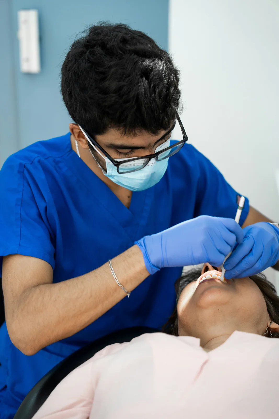 Implant procedure in progress, alongside the Implant Financing explanation in Toronto