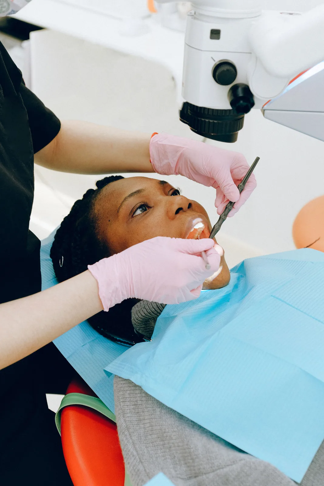 Microscope assisted dental treatment, shown while covering Implants In North York in Toronto