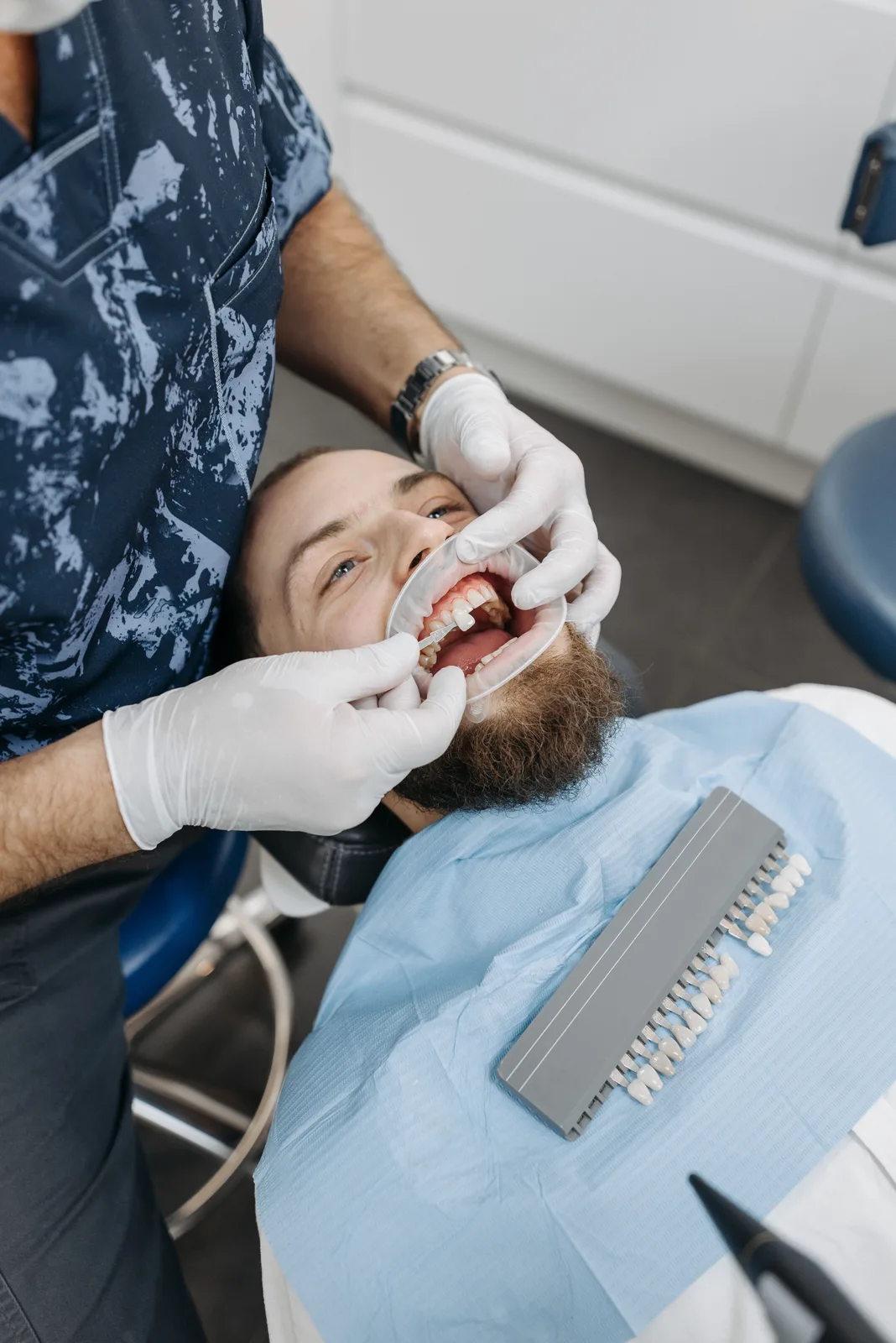 Selecting a crown shade chairside, alongside the Implant Surgery Day explanation in Toronto