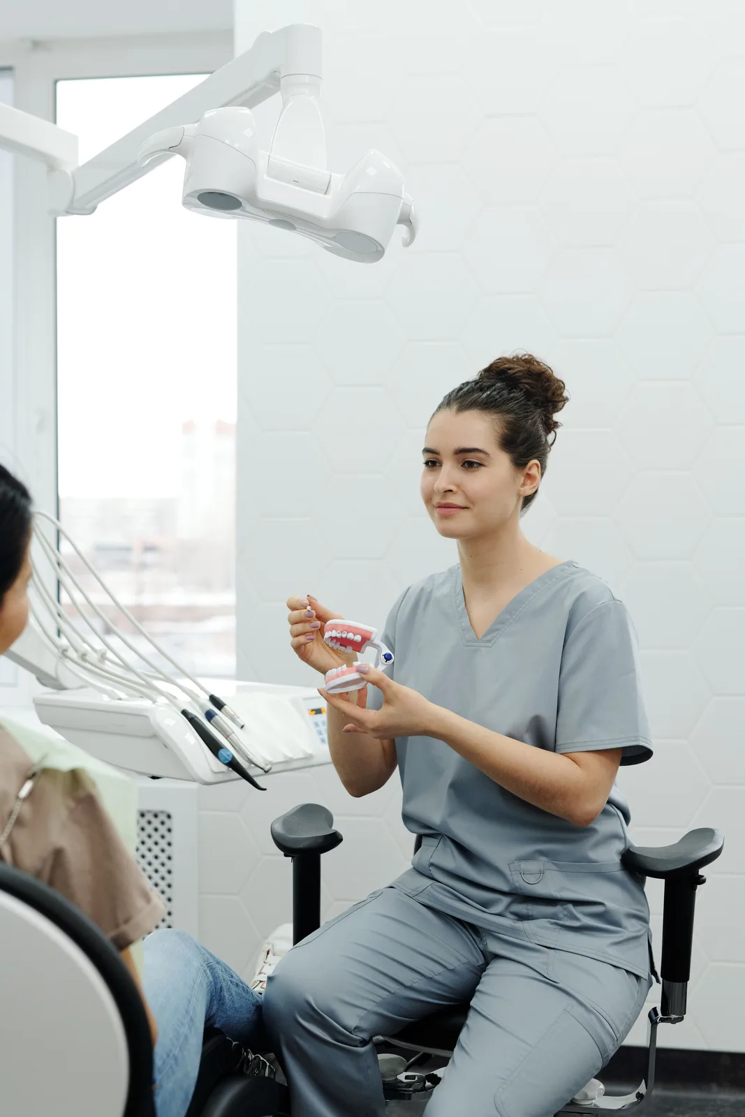 Treatment explained chairside in the operatory, shown while covering Bone Grafting in Toronto