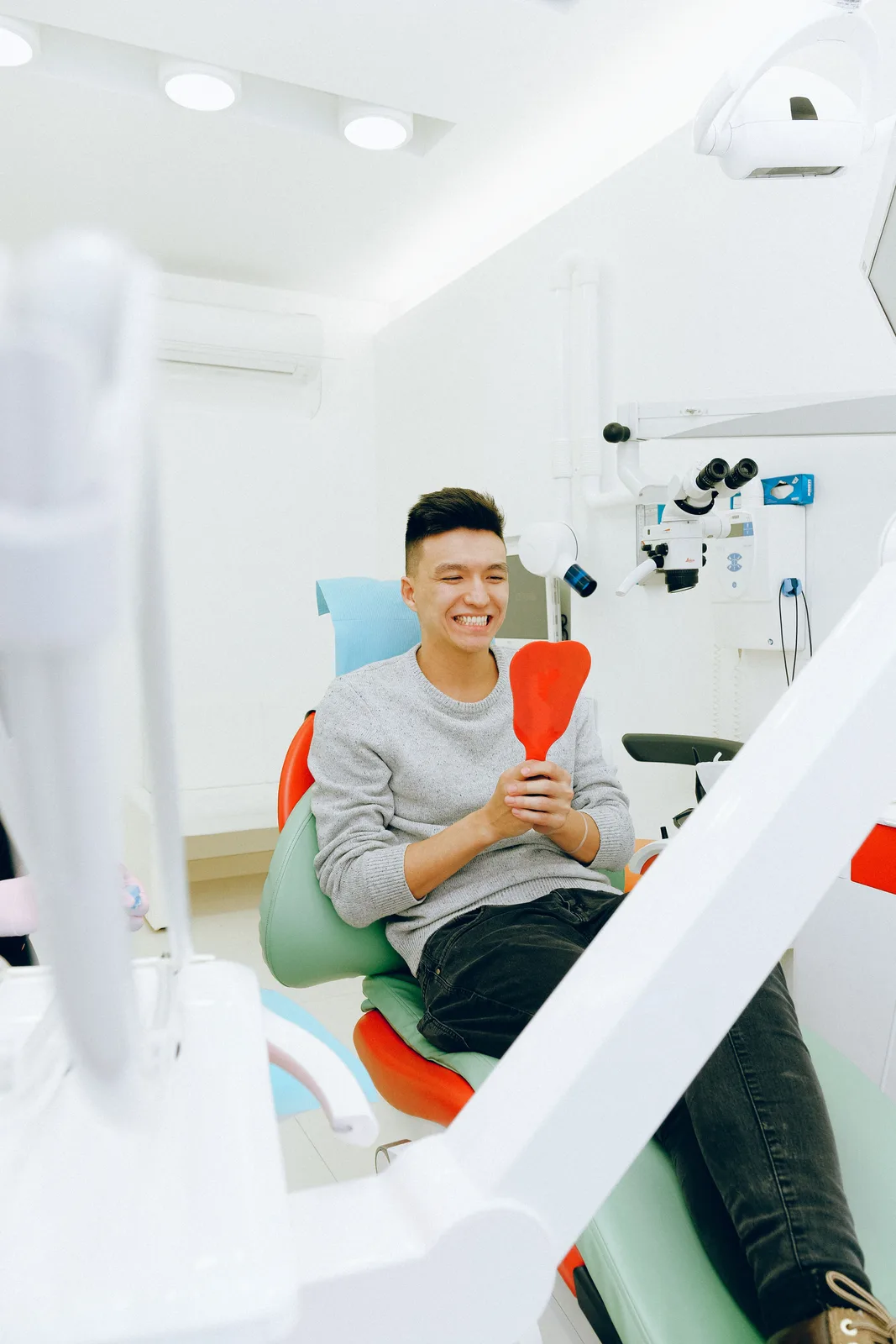 Young patient pleased with the result, referred to in the Implants In North York section for Toronto